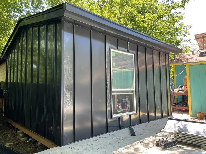 Black standing seam metal wall panels for Metal Roof Installation in Missoula