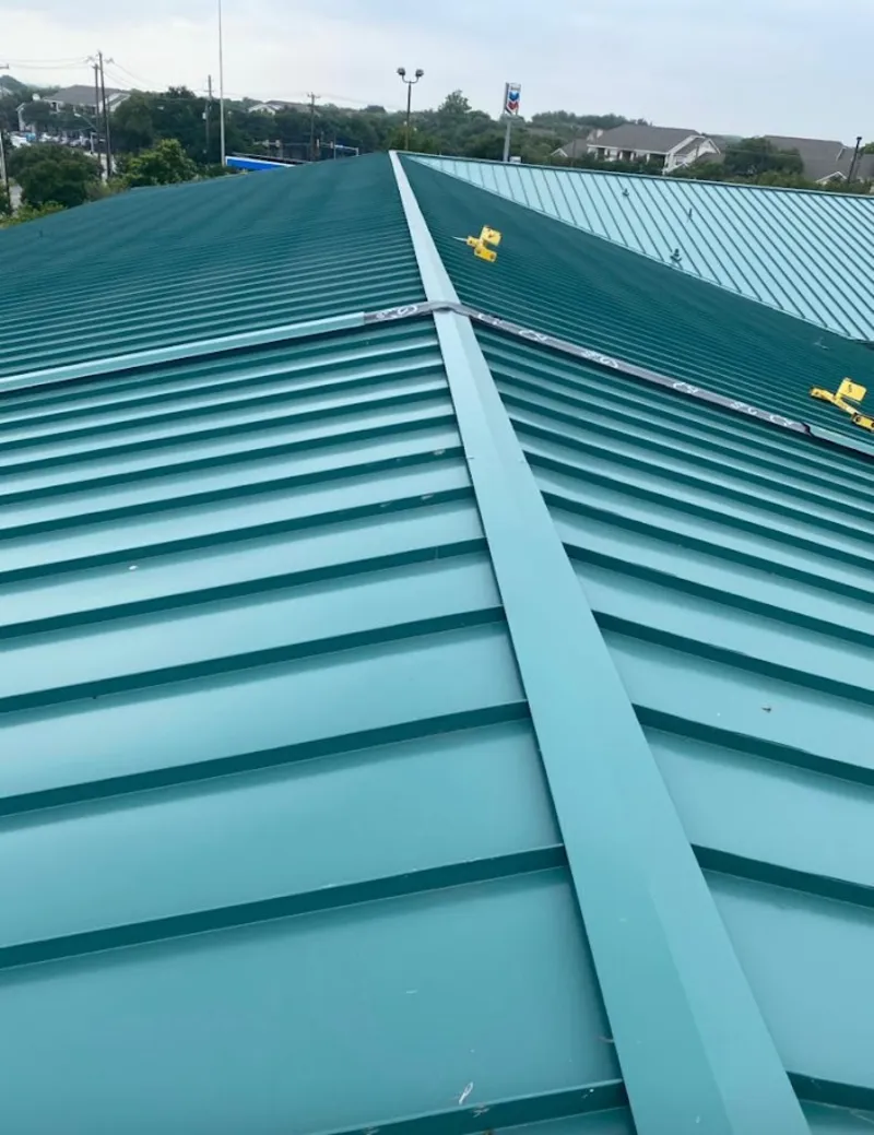Green commercial metal roof ridge and valley for Metal Roof Repair in Missoula