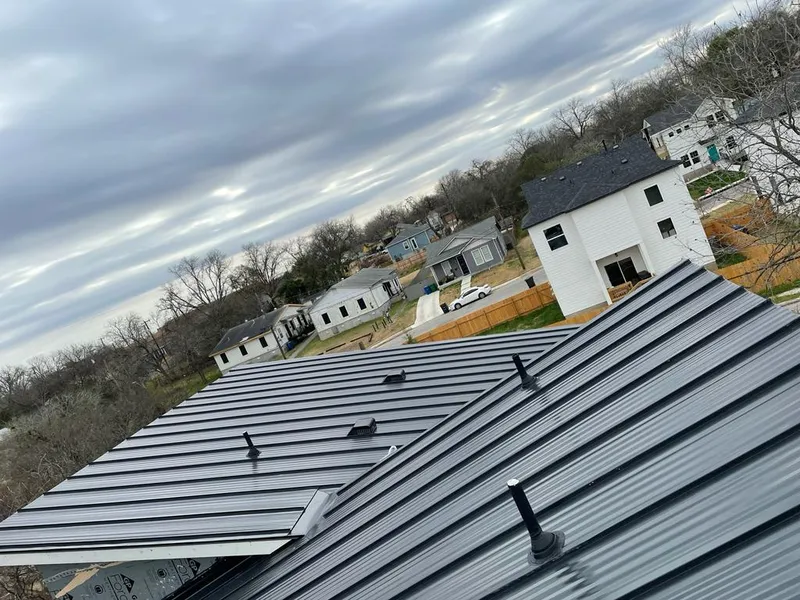 Standing seam metal roof panels with vents for Skylight Repair in Missoula